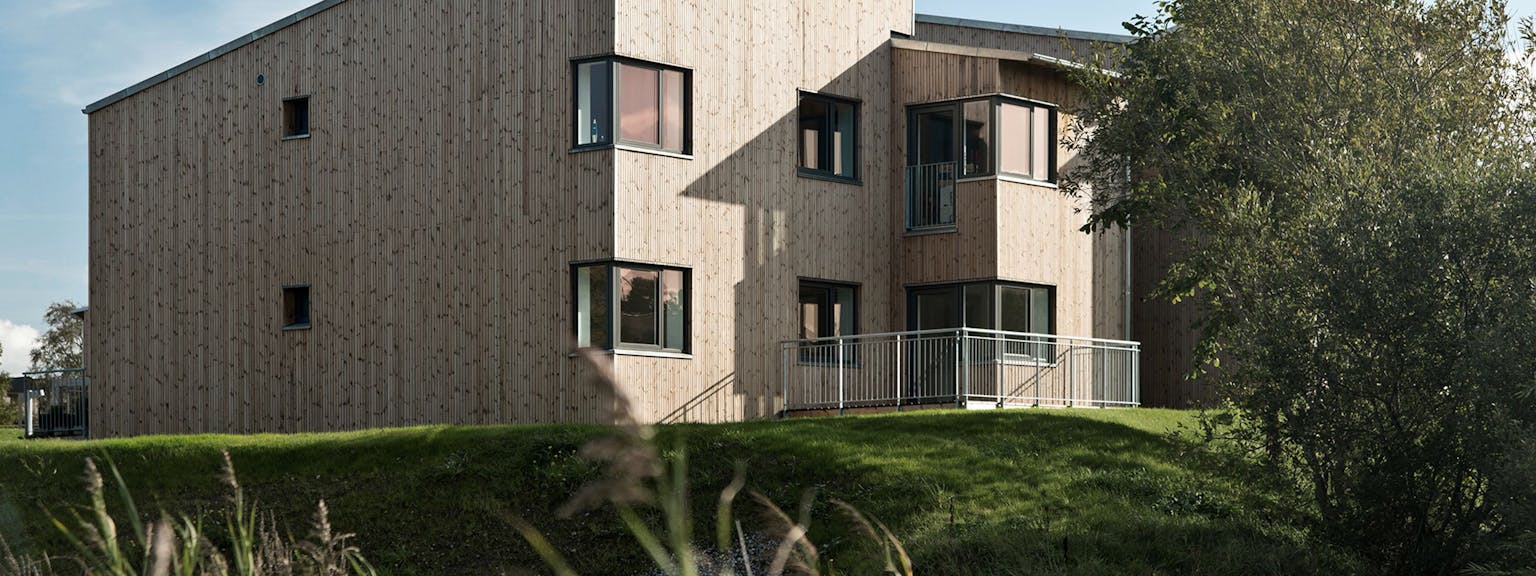 3D rendering af hus beklædt med svanemærket holdbart træ fra Frøslev